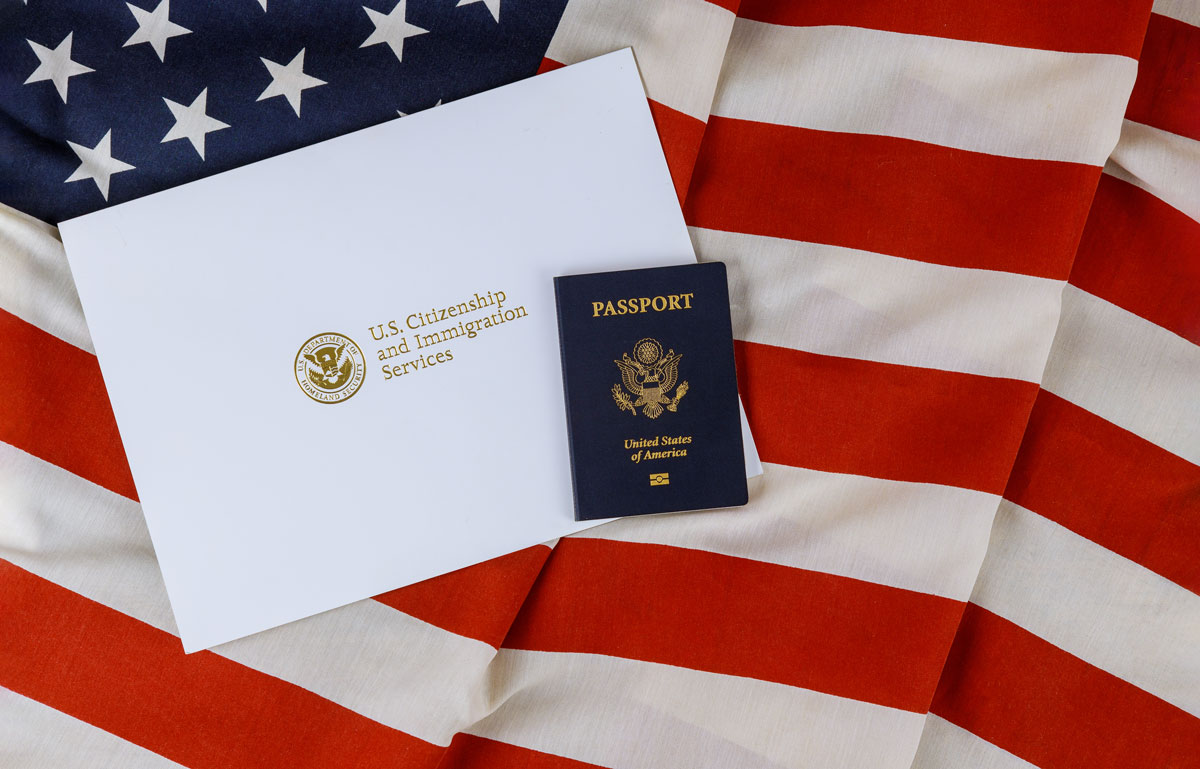 U.S. Citizenship and Immigration Services letter on an American flag