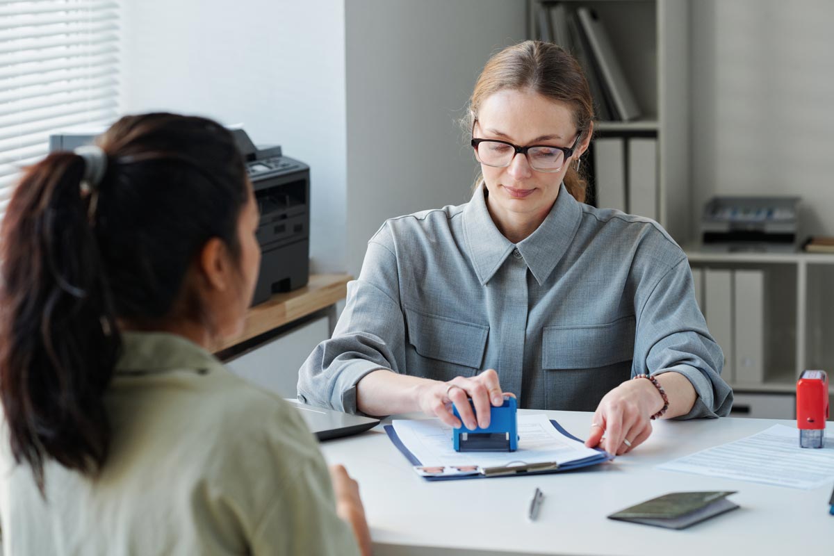 Immigration consultant providing services to a young woman