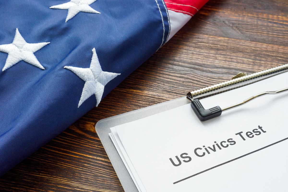 US Civics test for citizenship and USA flag