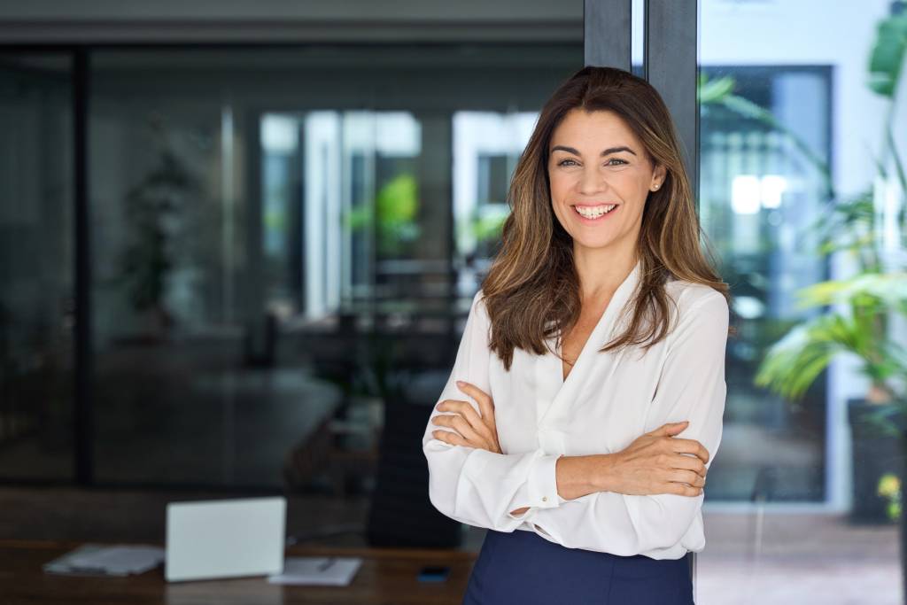 A smiling Latina attorney.