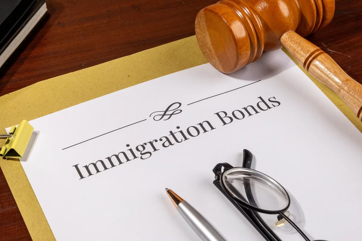 Immigration Bonds Document on Table with Gavel