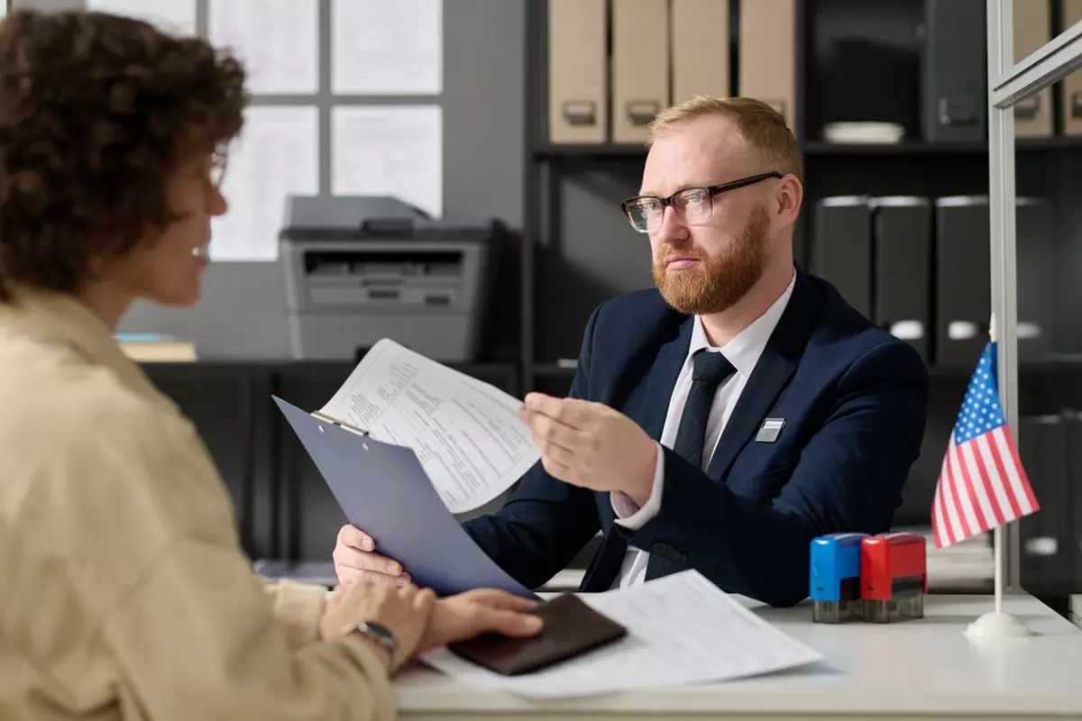 Man examining documentation for immigration case