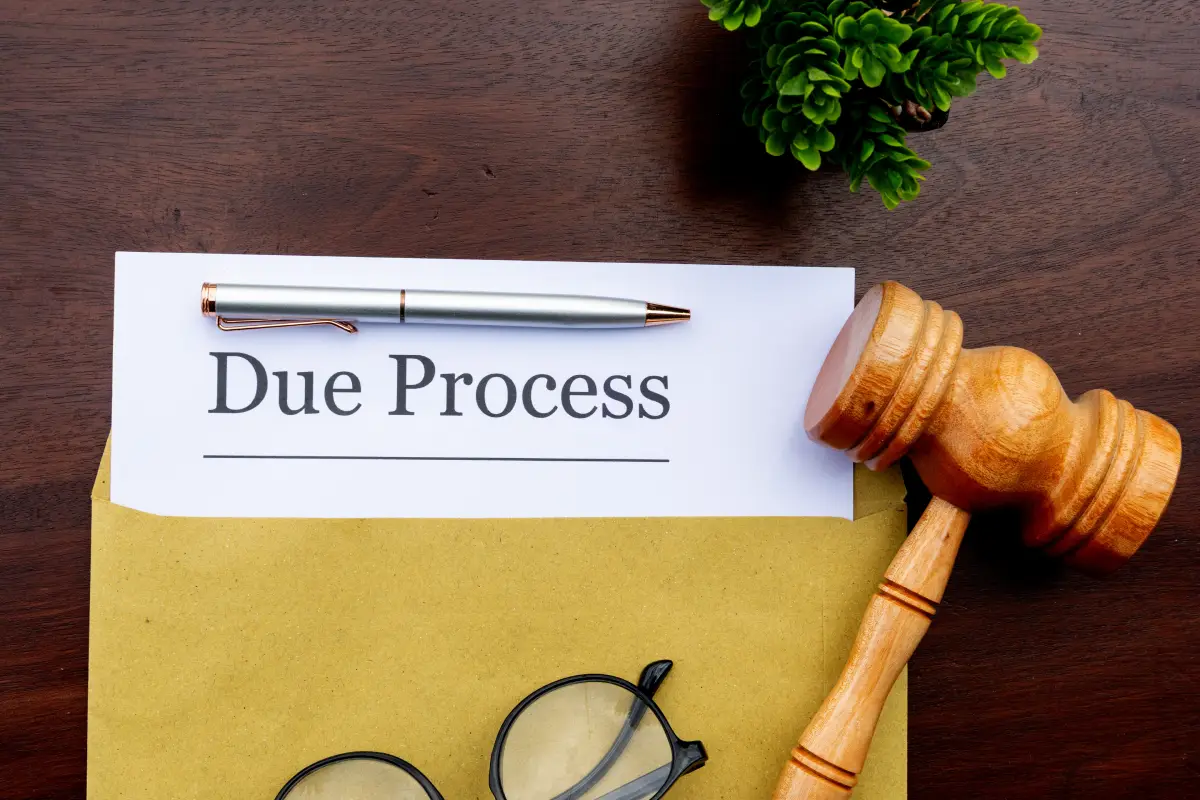 Document on desk with gavel next to it